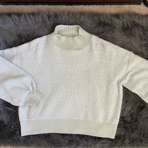 Green mock neck puff sleeved sweater